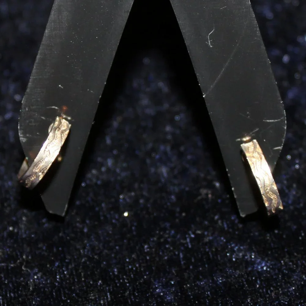 Gold toned hooped screw Earrings